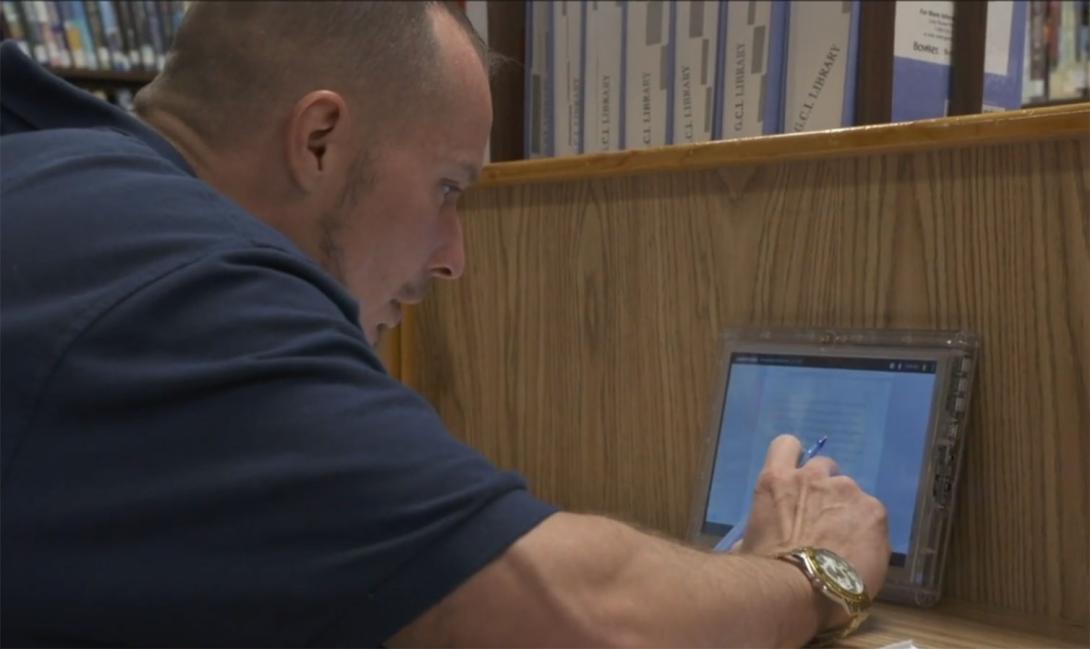 Correctional Education student studying with tablet